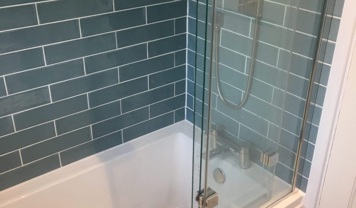 Green tiled top quality bathroom remodel by DSB Ltd Torbay