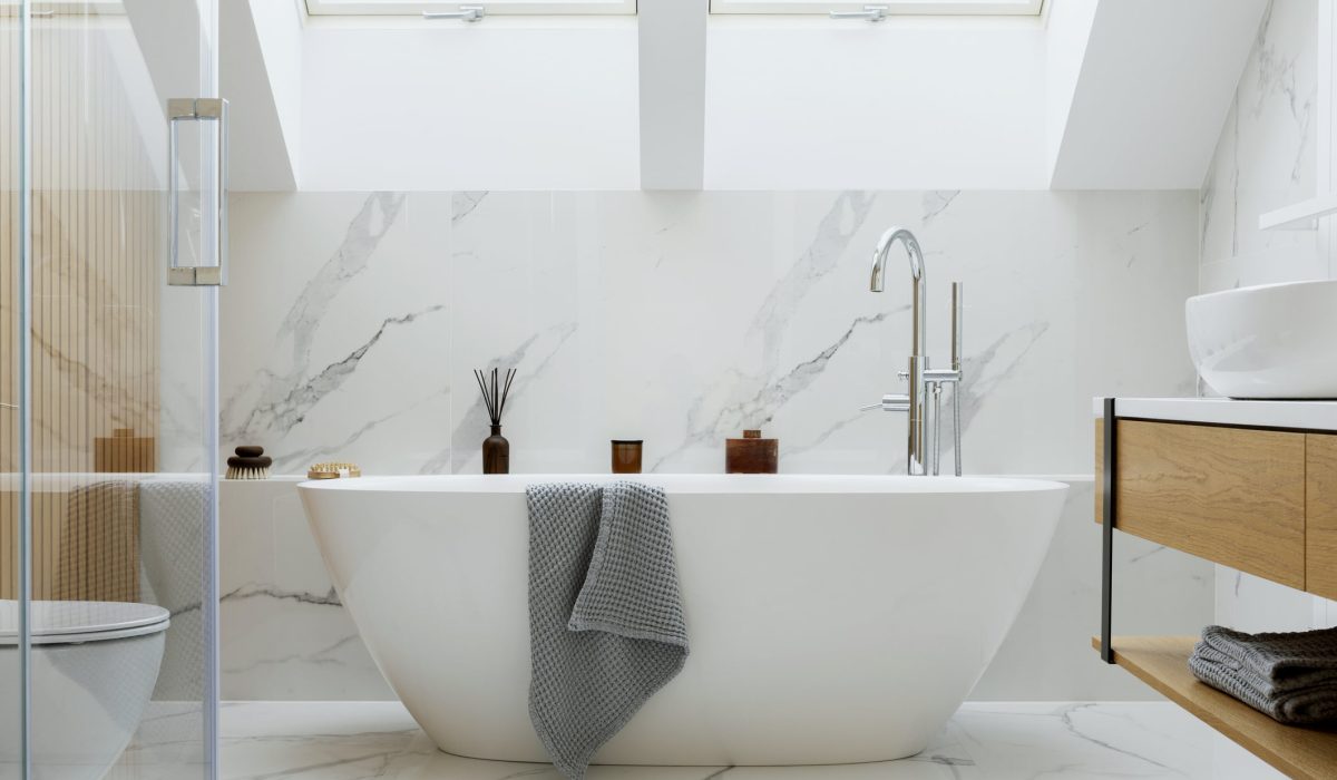 Stylish bathroom interior design with marble panels. Bathtub, towels and other personal bathroom accessories. Modern glamour interior concept. Roof window. Template."n